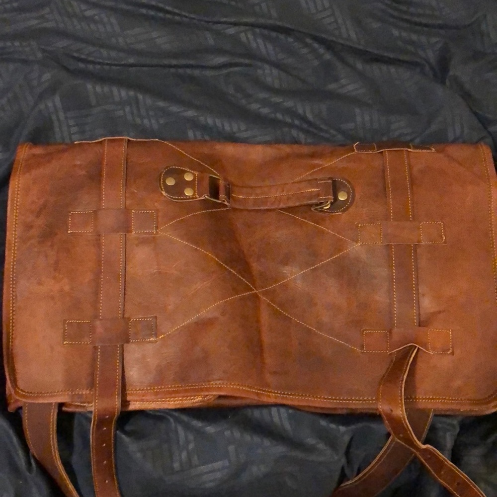 Unbranded leather strap bag